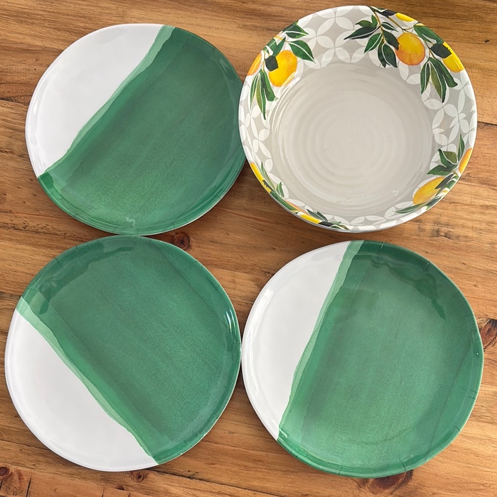 Green and White plastic Plates with bowl lemons